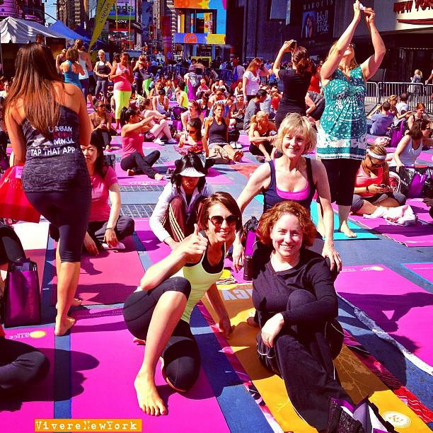 Solstice in Times Square practicing Mind Over Madness Yoga in the